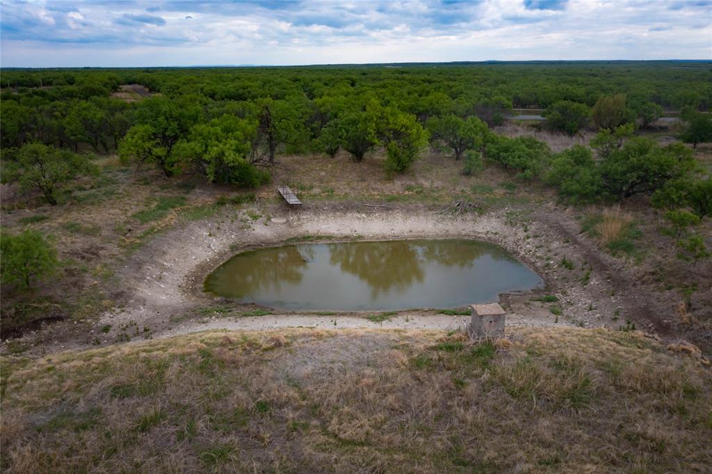 6 Albany Tx 76424 Breckenridge, TX 76424 - Photo 30 of 35 a view of a backyard with swimming pool