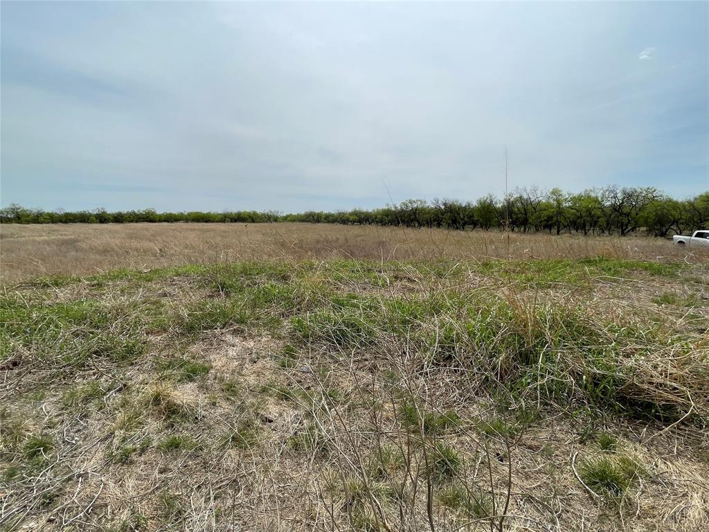 6 Albany Tx 76424 Breckenridge, TX 76424 - Photo 4 of 35 a view of a lake from a yard