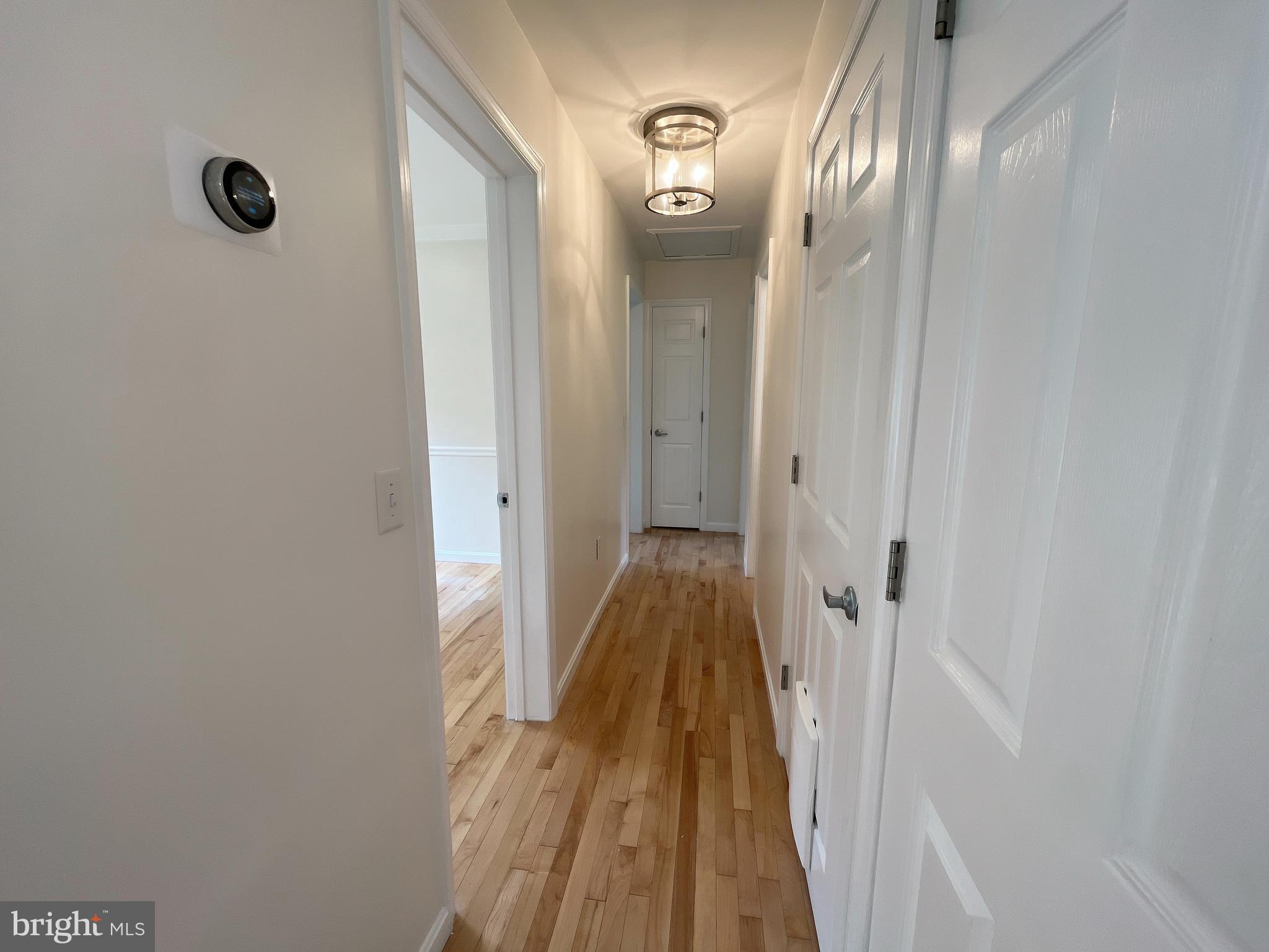 982 Shore Acres Road Arnold, MD 21012 - Photo 12 of 26 a view of a bathroom from the hallway
