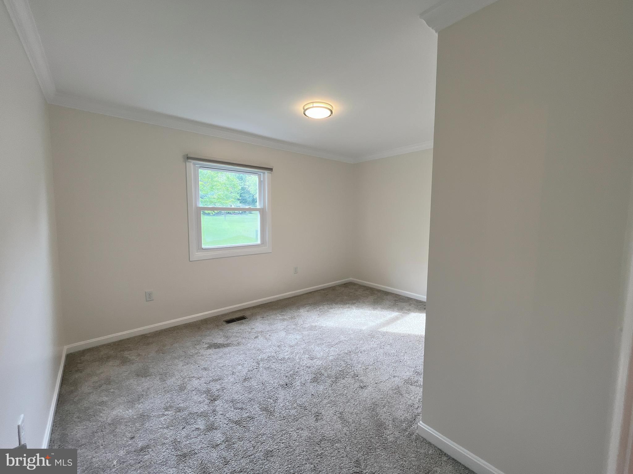 982 Shore Acres Road Arnold, MD 21012 - Photo 17 of 26 an empty room with windows