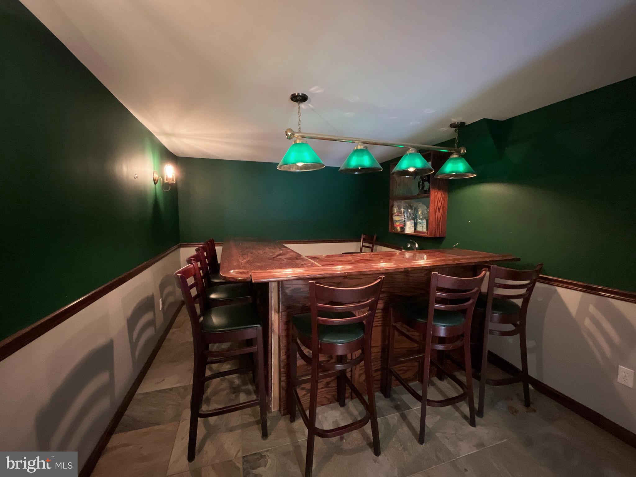 982 Shore Acres Road Arnold, MD 21012 - Photo 24 of 26 a view of an outdoor space with table and chairs