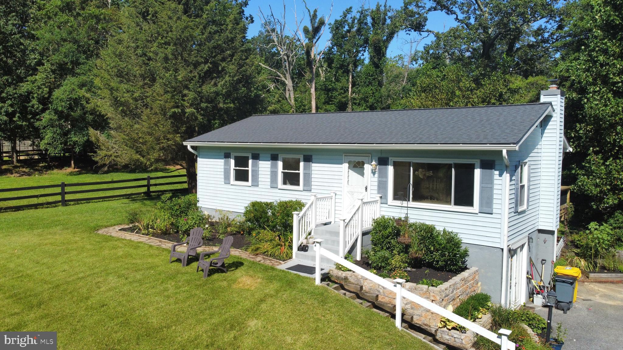 982 Shore Acres Road Arnold, MD 21012 - Photo 3 of 26 a house that has a tree in it