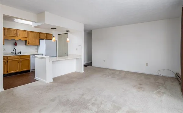 a view of a kitchen with a sink