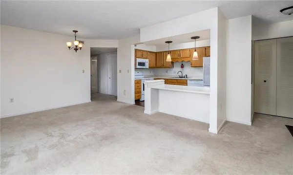 a view of a kitchen with a sink and cabinet area