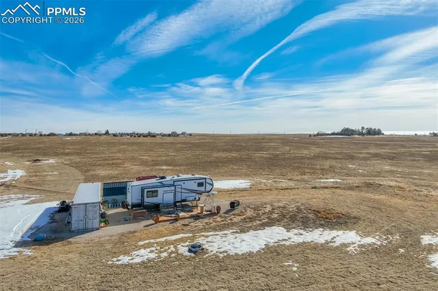 a view of a lake with a beach