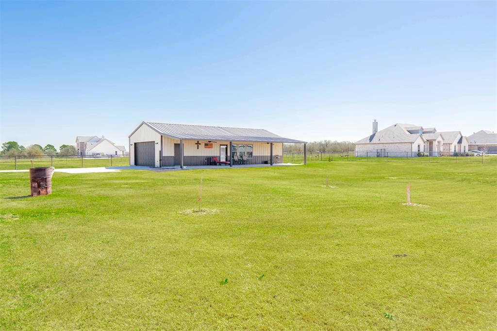 849 County Road 4764 Boyd, TX 76023 - Photo 26 of 40 a view of a big room with an ocean beach and seating area