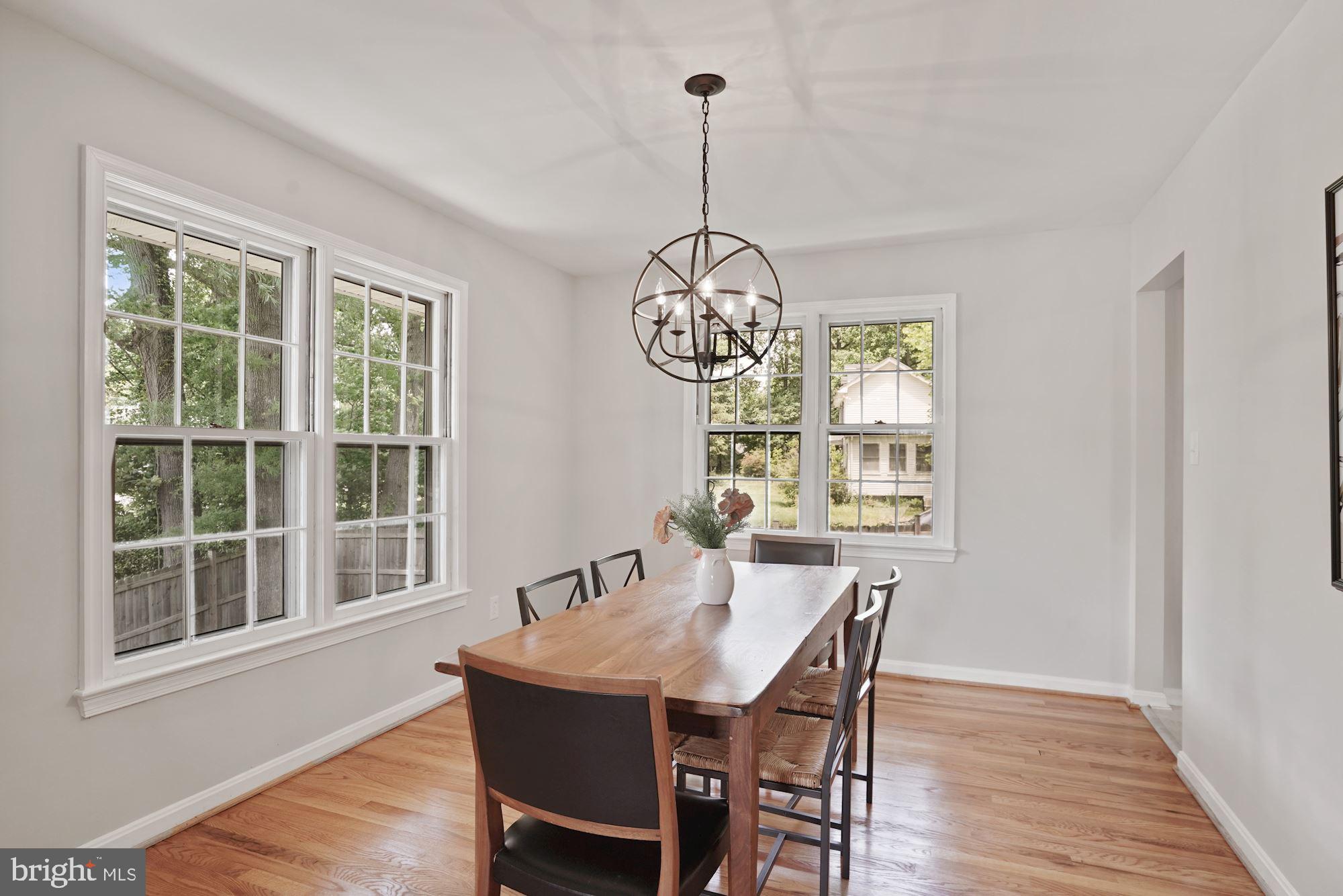 2104 Old Stage Road Alexandria, VA 22308 - Photo 13 of 39 Dining Room side windows with patio view