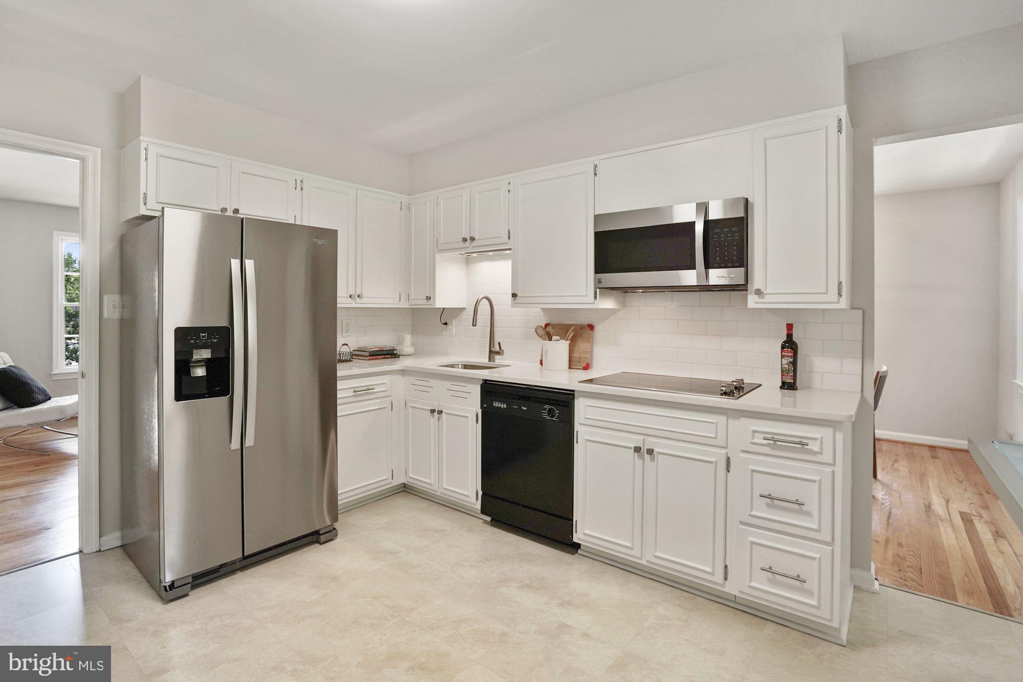 2104 Old Stage Road Alexandria, VA 22308 - Photo 14 of 39 Updated kitchen with quartz counters SS appliances