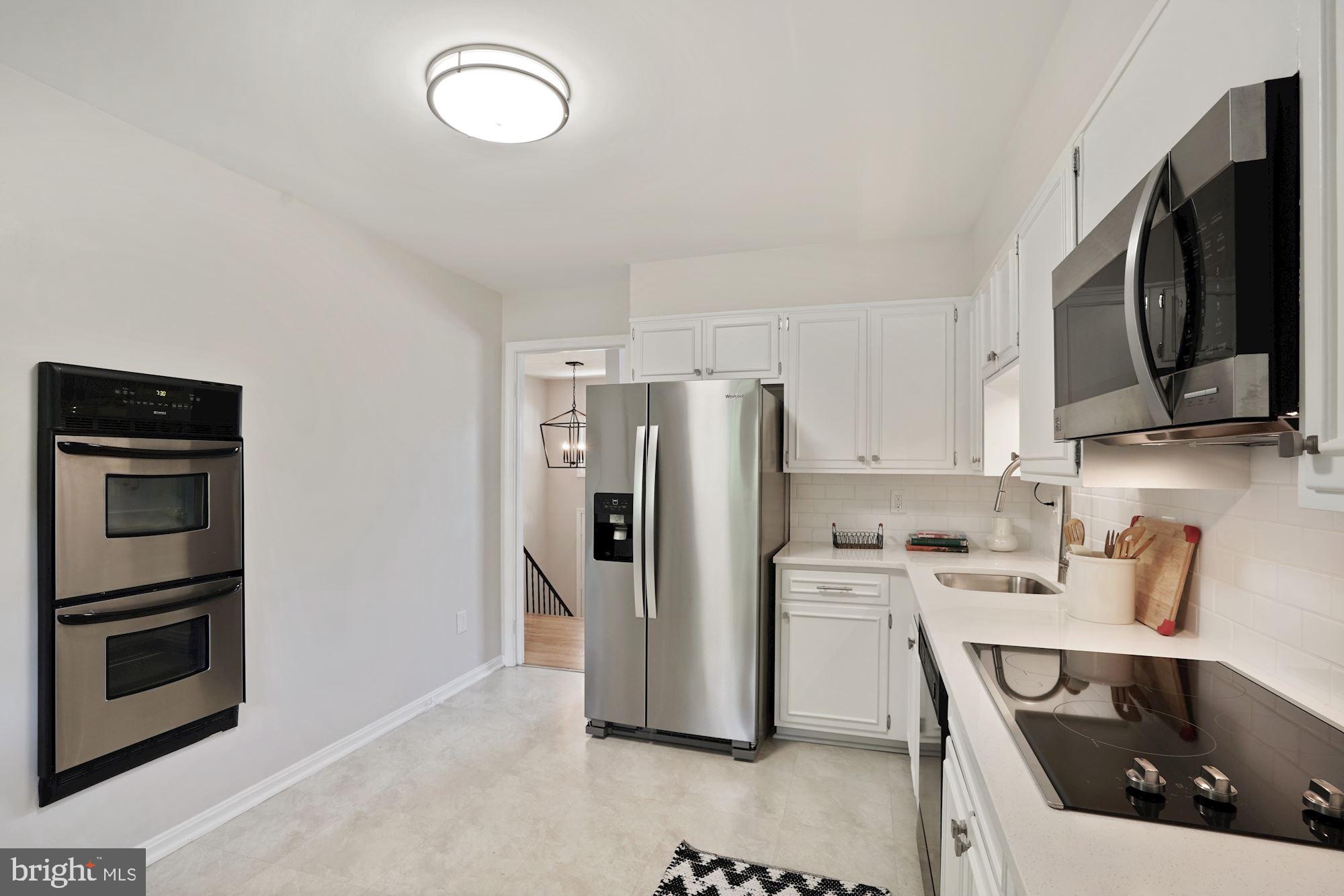 2104 Old Stage Road Alexandria, VA 22308 - Photo 15 of 39 Kitchen with built in oven and cooktop