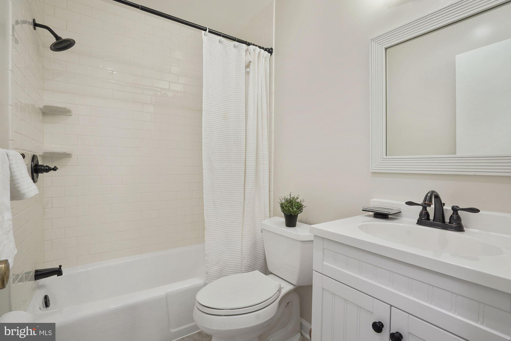2104 Old Stage Road Alexandria, VA 22308 - Photo 21 of 39 Renovated hall bath