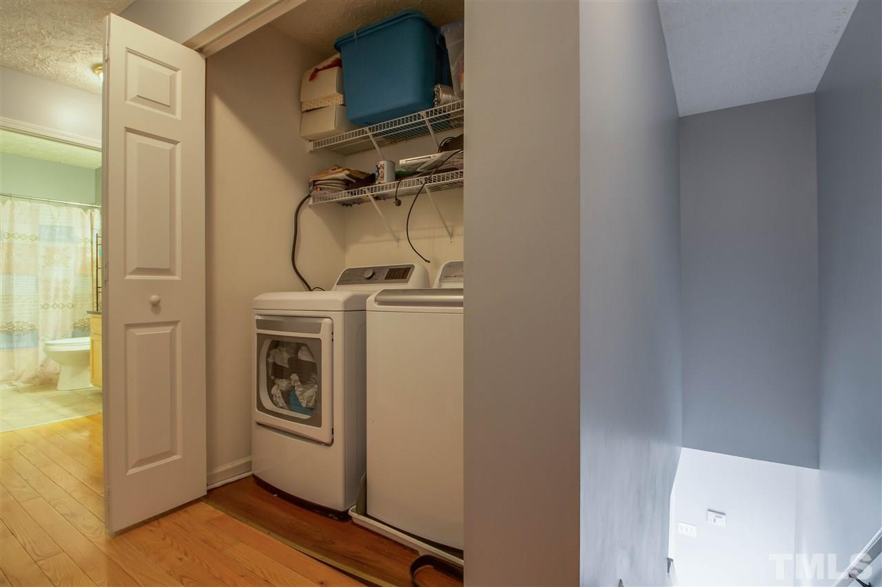 5729 Forest Point Road Raleigh, NC 27610 - Photo 21 of 26 a utility room with dryer and washer
