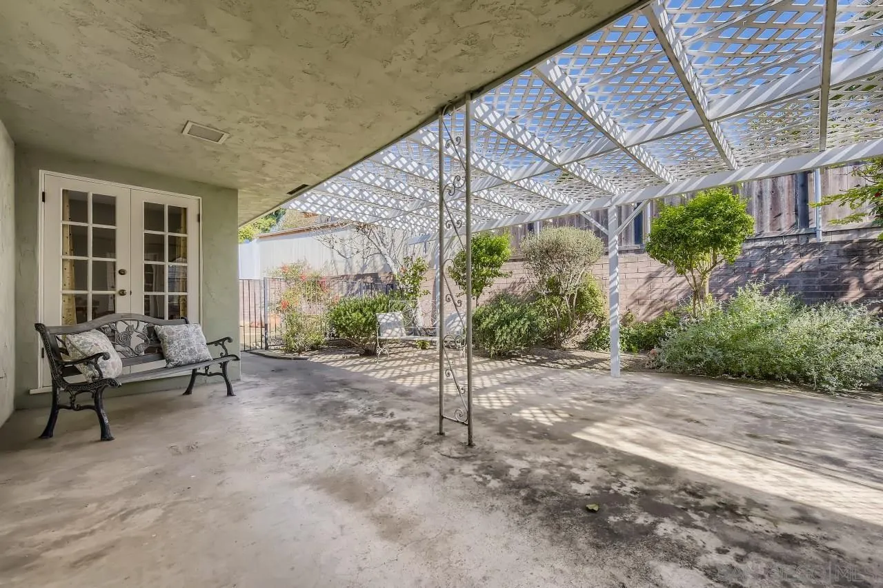 10158 Madrid Way Spring Valley, CA 91977 - Photo 21 of 27 a view of a house with backyard and sitting area