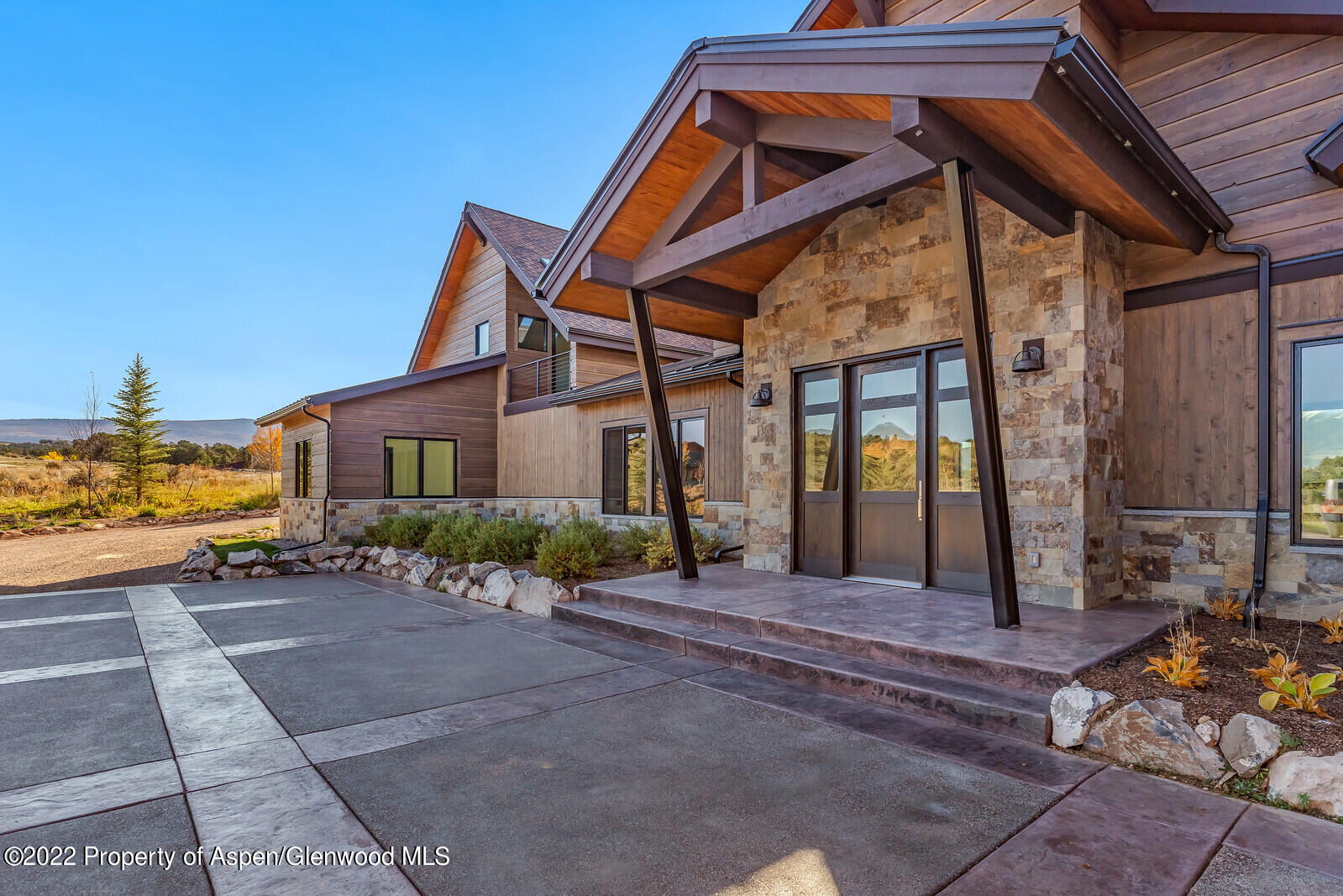 a view of a house with a patio