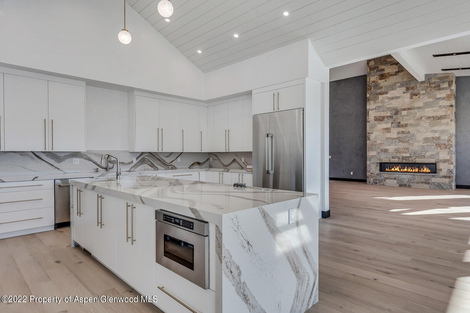 1093 Callicotte Ranch Road Carbondale, CO 81623 - Photo 12 of 27 a kitchen with stainless steel appliances granite countertop a stove and a refrigerator