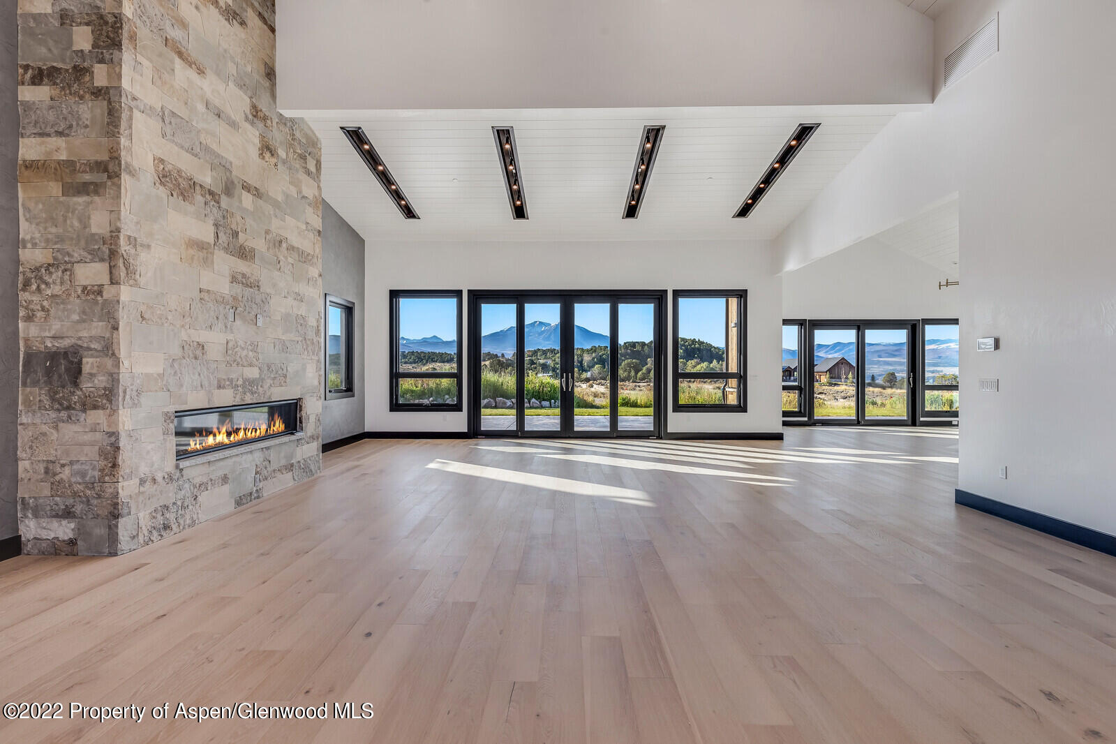1093 Callicotte Ranch Road Carbondale, CO 81623 - Photo 7 of 27 an empty room with windows