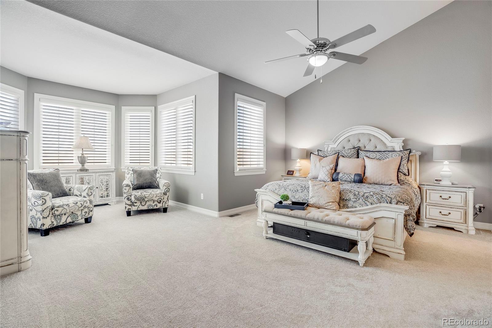 7285 Sagebrush Drive Parker, CO 80138 - Photo 23 of 46 a bedroom with bed and white roof