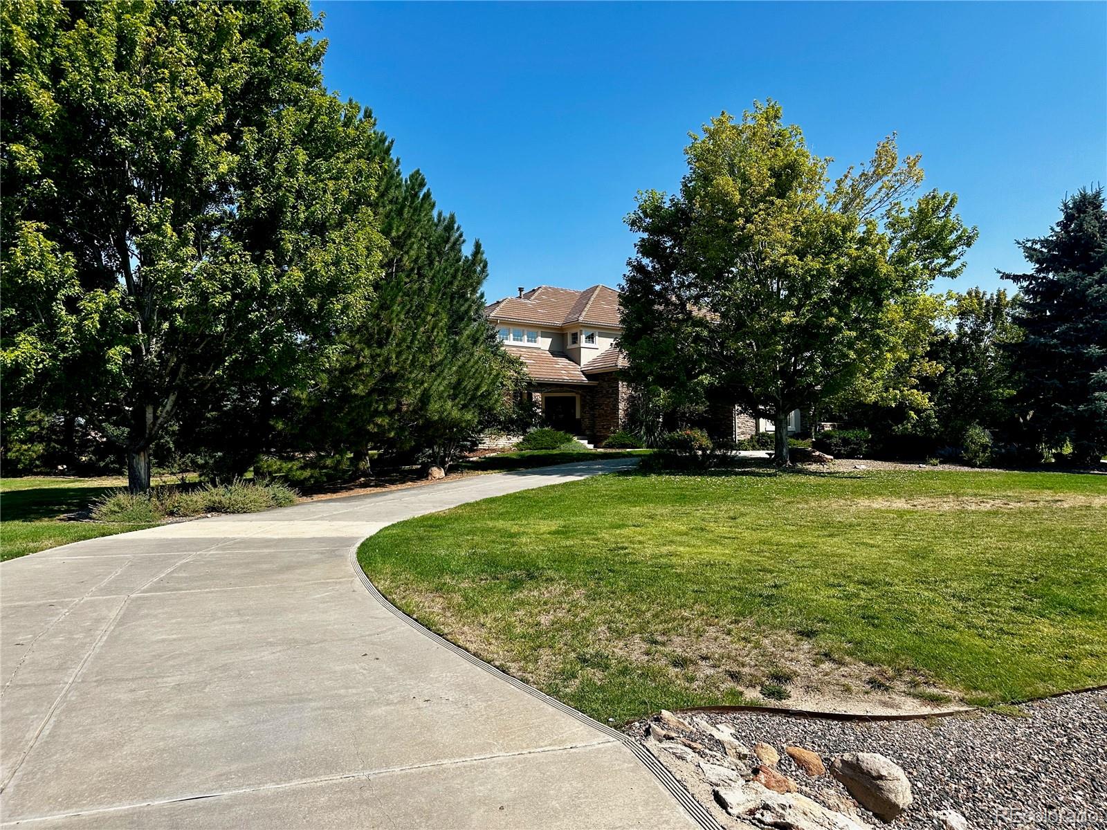 7285 Sagebrush Drive Parker, CO 80138 - Photo 4 of 46 a view of a park with large trees
