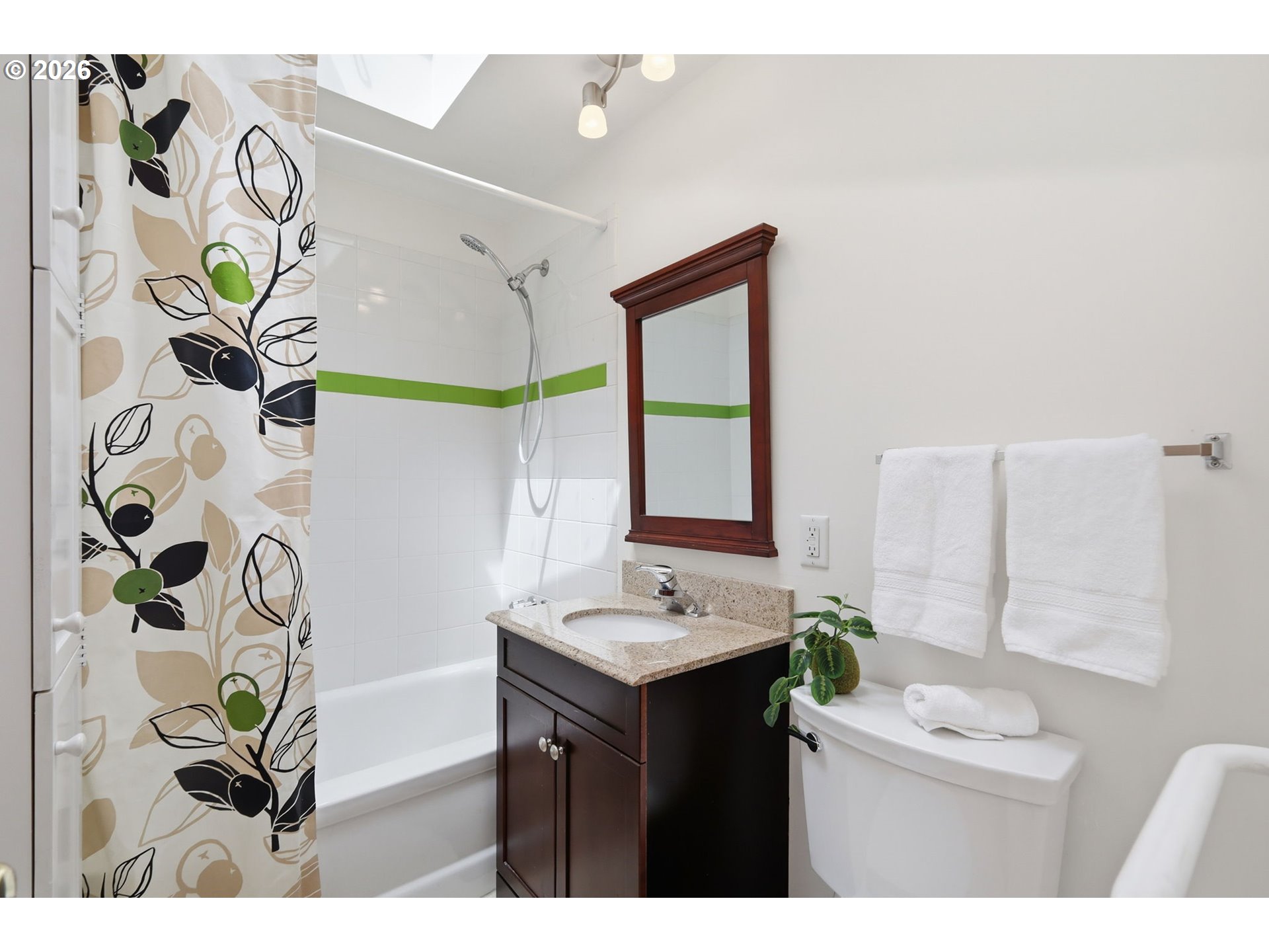 3025 Harris Street Eugene, OR 97405 - Photo 28 of 44 a bathroom with a sink and a mirror