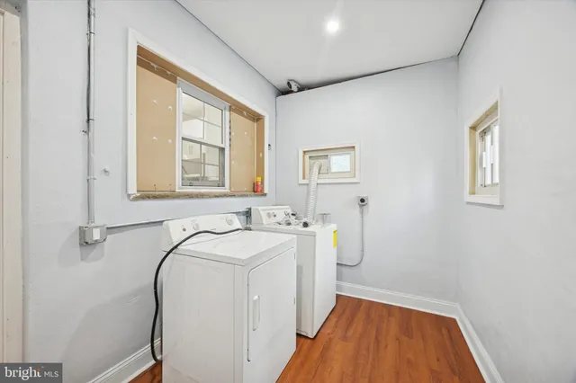 a utility room with dryer and washer
