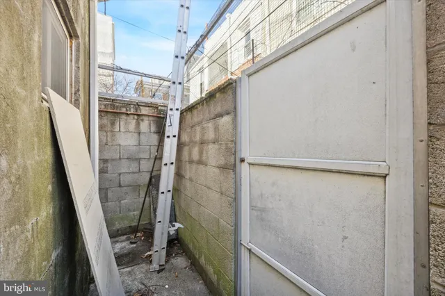 a bathroom with a glass door shower