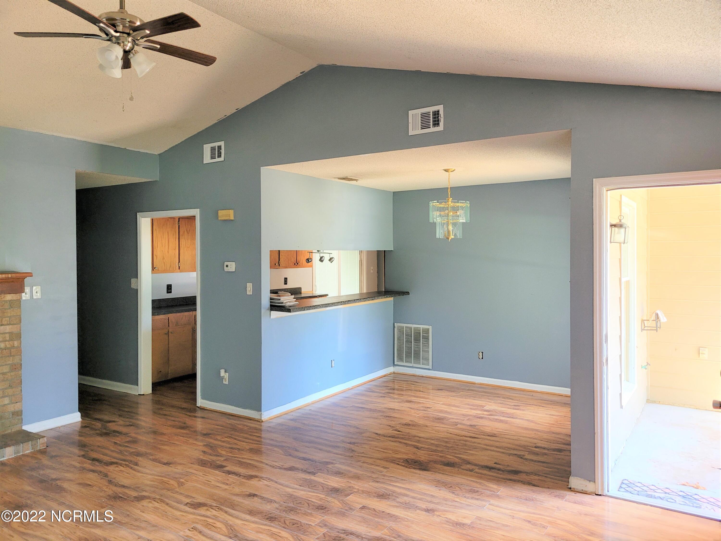 548 Shadowridge Road Jacksonville, NC 28546 - Photo 6 of 29 Living Room to Dining Room
