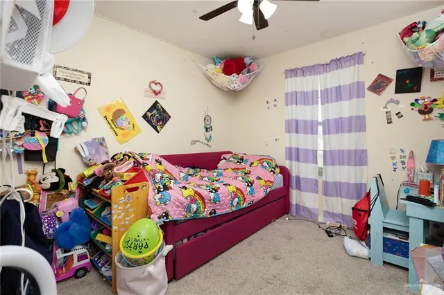 a bathroom with a sink toilet and a mirror