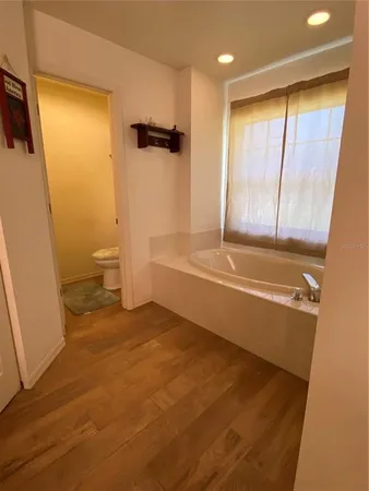 a bathroom with a sink and a shower