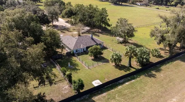 a view of swimming pool from a yard