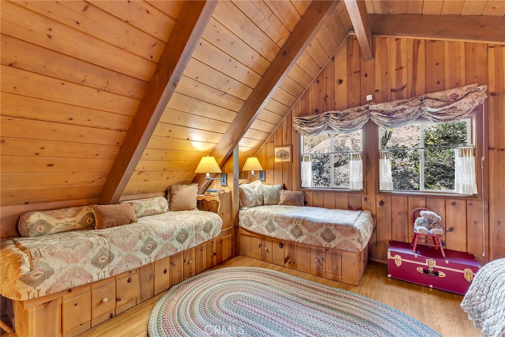 25300 Pine Crest Avenue Idyllwild, CA 92549 - Photo 36 of 75 Built in beda in loft. Amazing boulders outside provide privacy.