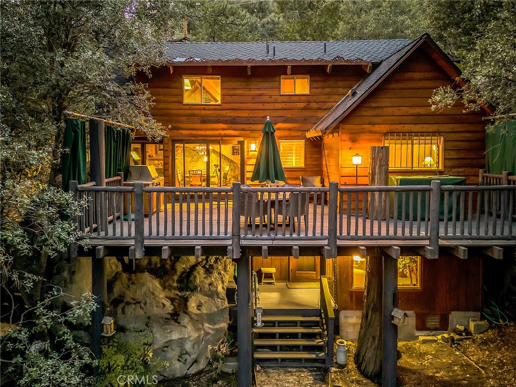 25300 Pine Crest Avenue Idyllwild, CA 92549 - Photo 5 of 75 Rear of the home in the evening glow.