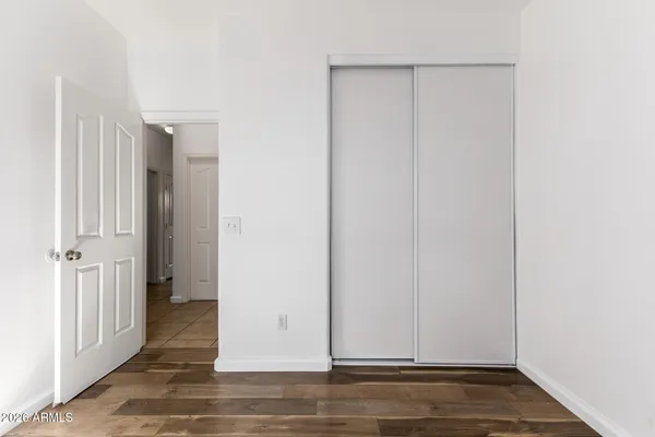 a view of a livingroom with wooden floor