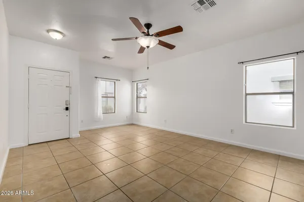 a view of an empty room with a window