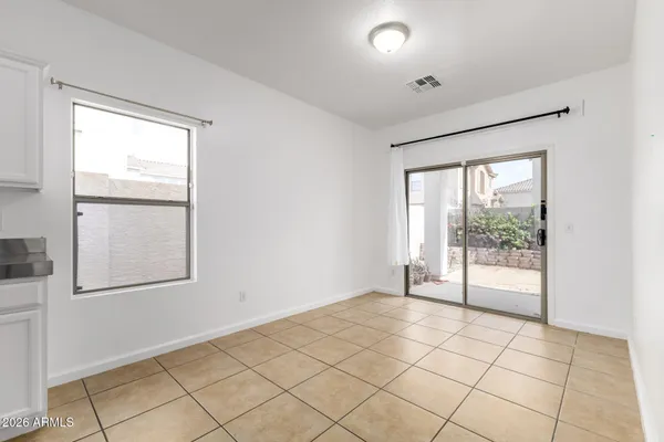 a view of an empty room and window