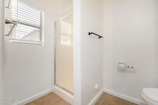 a view of bathroom with a window