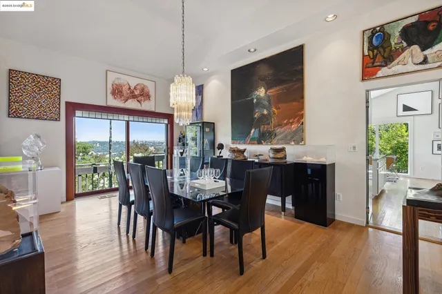 a terrace with outdoor seating and wooden floor