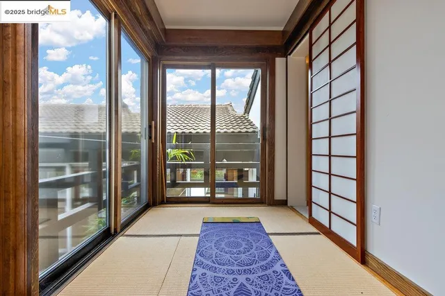 a view of a entryway door with furniture