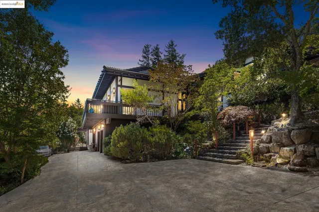 a view of a house with brick walls