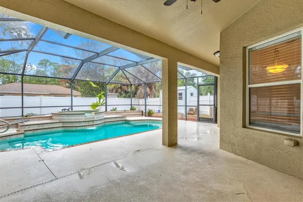 a view of a house with a swimming pool