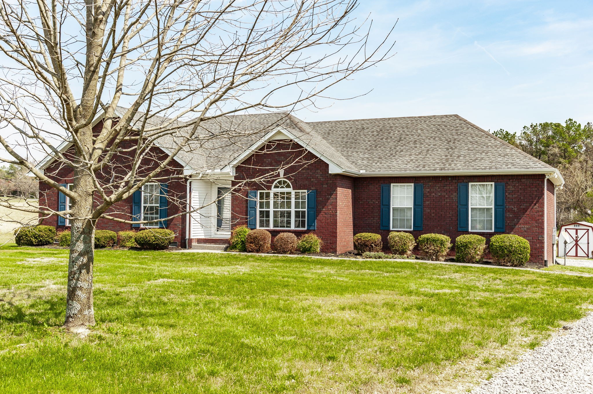 7535 Swift Road Greenbrier, TN 37073 - Photo 2 of 51 a front view of a house with a yard