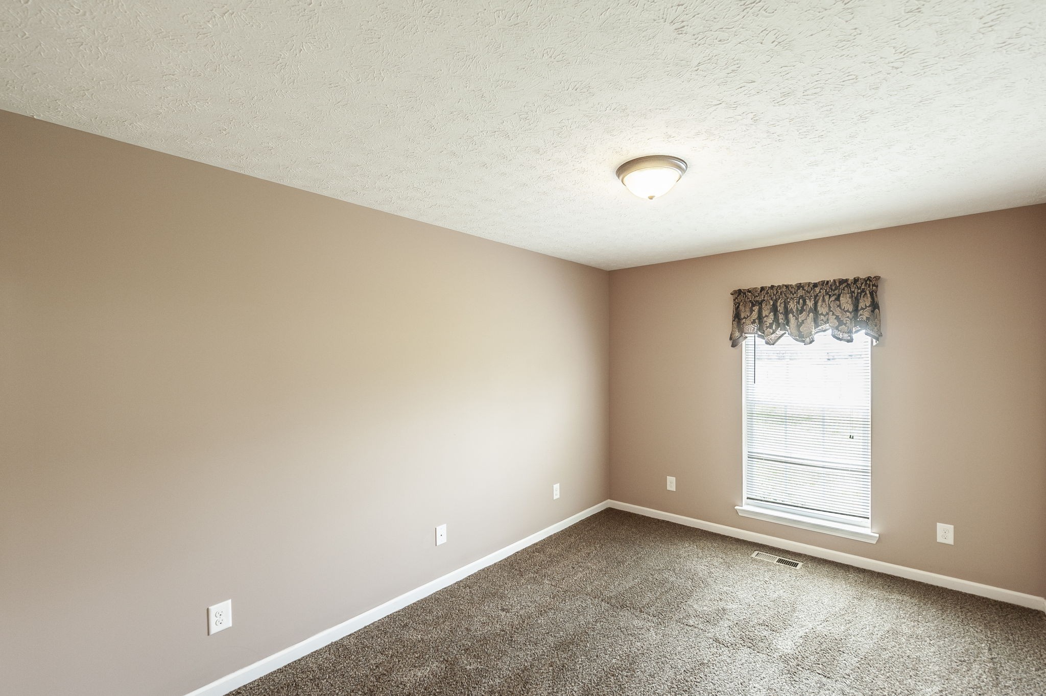 7535 Swift Road Greenbrier, TN 37073 - Photo 34 of 51 a view of an empty room and a window