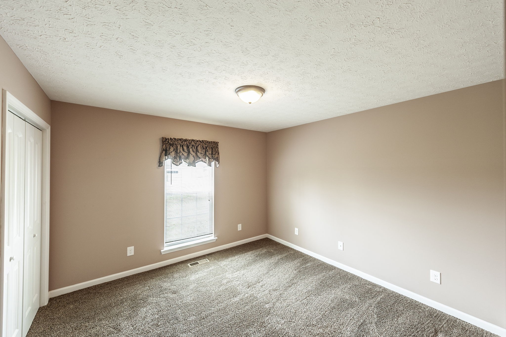 7535 Swift Road Greenbrier, TN 37073 - Photo 36 of 51 an empty room with a window