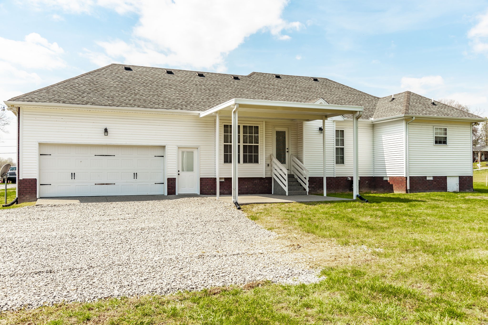 7535 Swift Road Greenbrier, TN 37073 - Photo 44 of 51 a front view of a house with a yard