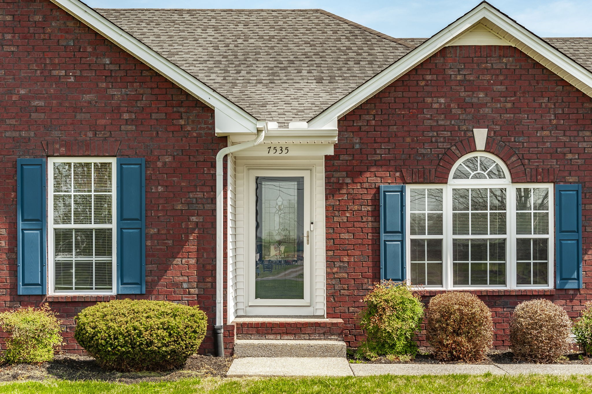 7535 Swift Road Greenbrier, TN 37073 - Photo 5 of 51 a front view of a house with a yard