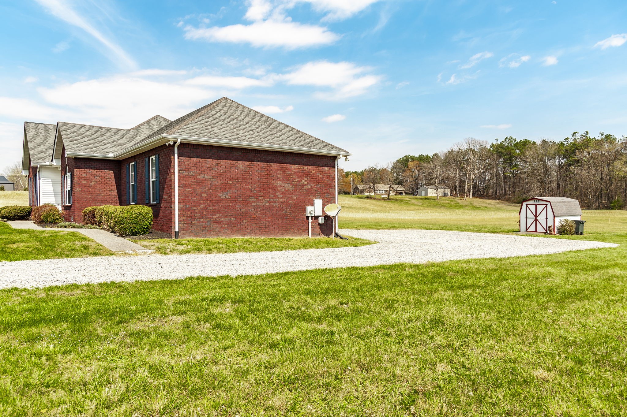 7535 Swift Road Greenbrier, TN 37073 - Photo 6 of 51 a front view of a house with a yard