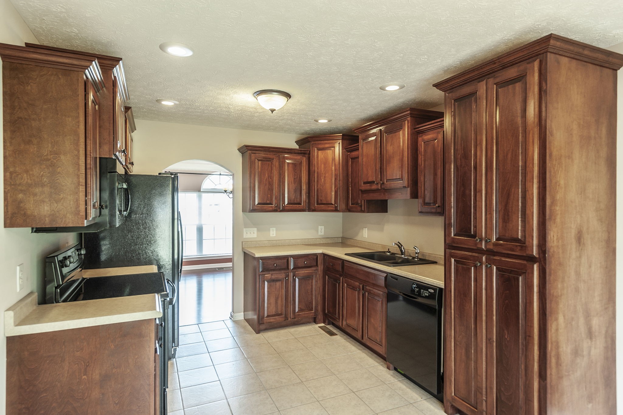 7535 Swift Road Greenbrier, TN 37073 - Photo 8 of 51 a kitchen with stainless steel appliances granite countertop a sink a stove and a refrigerator