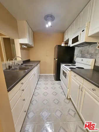 $2,495 | 5460 White Oak Avenue, Unit C223, Encino, CA 91316