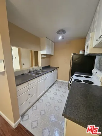 $2,495 | 5460 White Oak Avenue, Unit C223, Encino, CA 91316