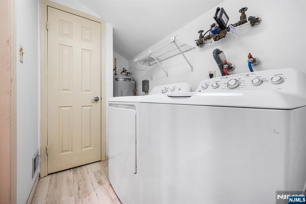 11A Rothwell Drive, Unit 11D Monroe Township, NJ 08831 - Photo 31 of 47 a bathroom with a sink and mirror
