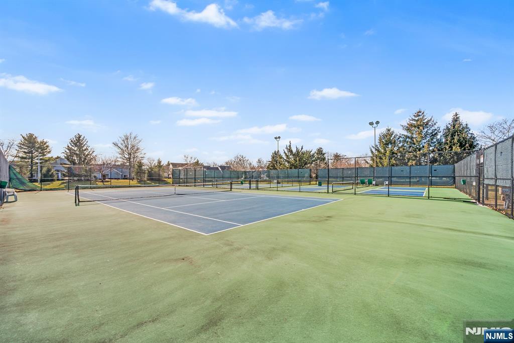 11A Rothwell Drive, Unit 11D Monroe Township, NJ 08831 - Photo 36 of 47 a view of a tennis court