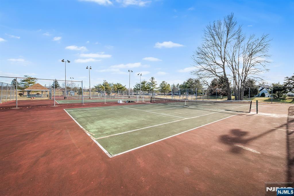 11A Rothwell Drive, Unit 11D Monroe Township, NJ 08831 - Photo 37 of 47 a view of a tennis court